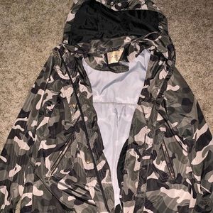 Camouflage rain coat